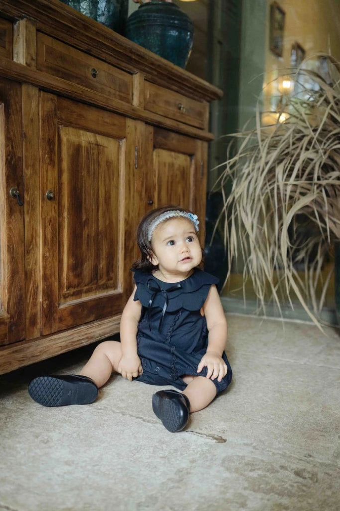Mirabelle Black Romper – Tiered Scallop Romper
